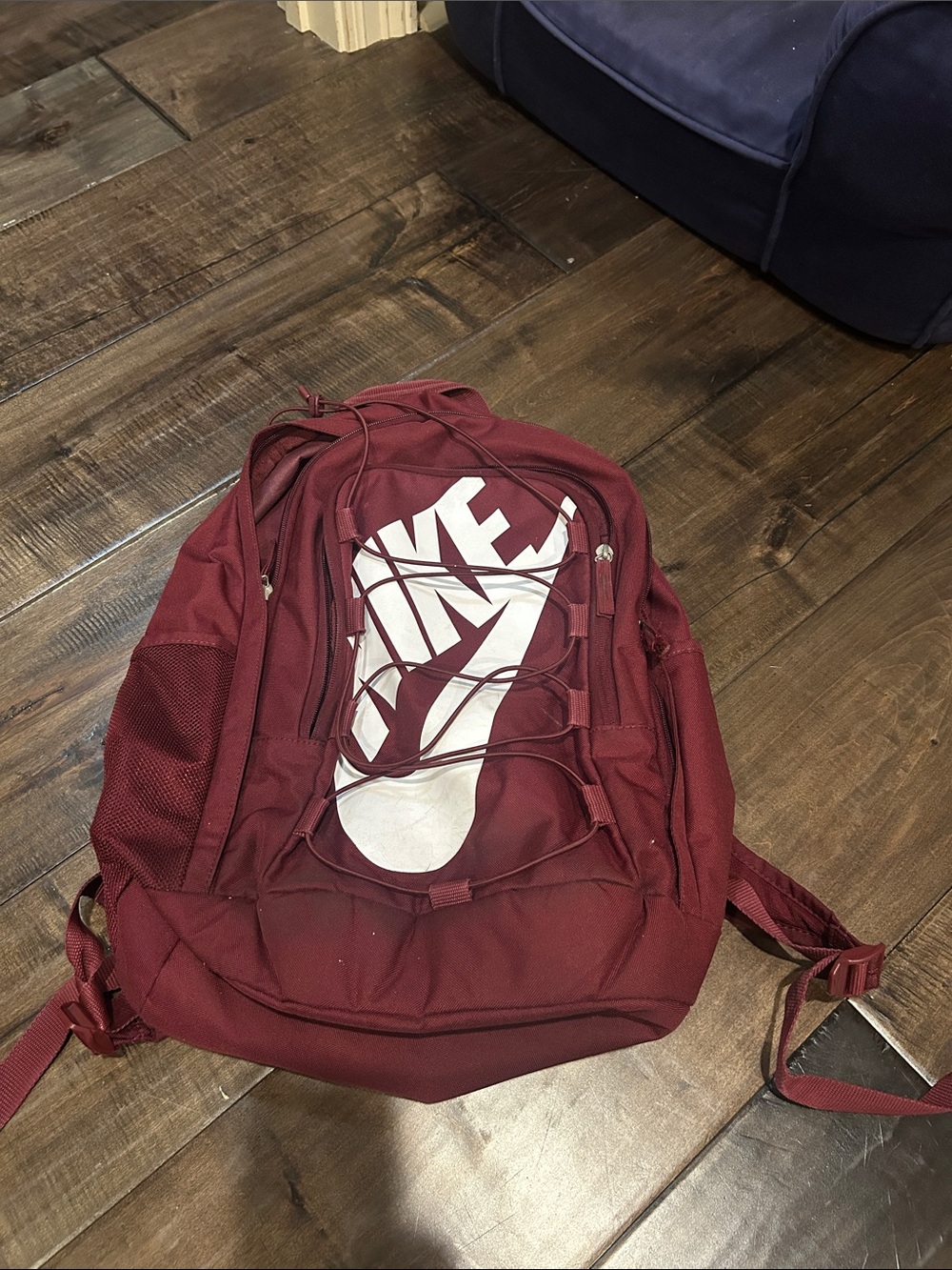 Nike Maroon Backpack with White Swoosh and Front Bungee
